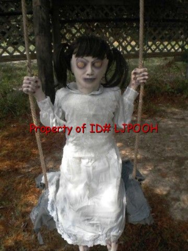 Swing Halloween Decoration
 LIFESIZE ANIMATED DEMONIC LITTLE ZOMBIE GIRL on SWING