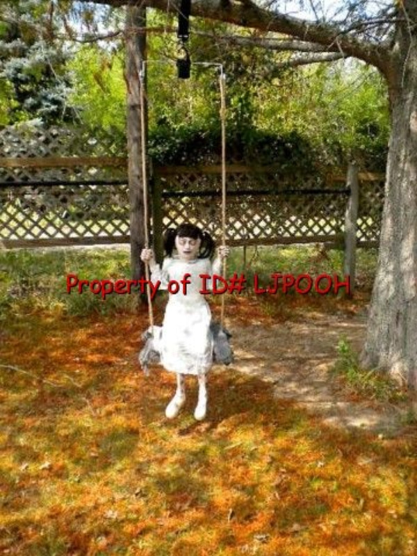 Swing Halloween Decoration
 LIFESIZE ANIMATED DEMONIC LITTLE ZOMBIE GIRL on SWING