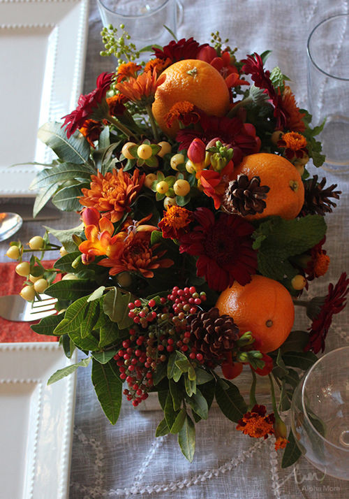 Thanksgiving Flower Centerpiece
 Thanksgiving Centerpiece With Oranges Berries & Flowers