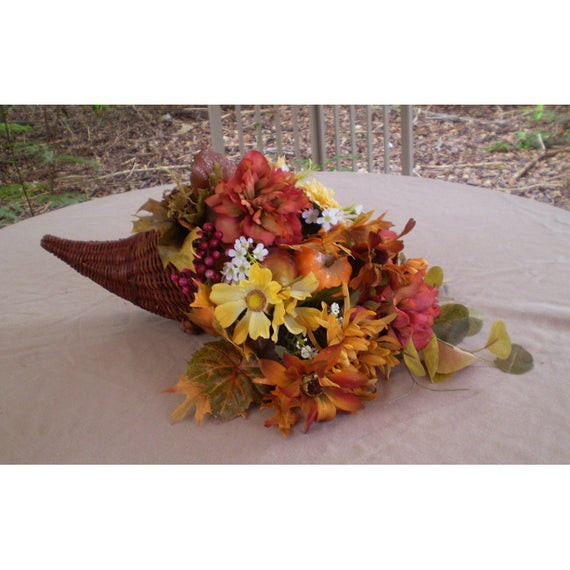 Thanksgiving Flower Centerpieces
 Thanksgiving floral centerpiece cornucopia flower arrangement