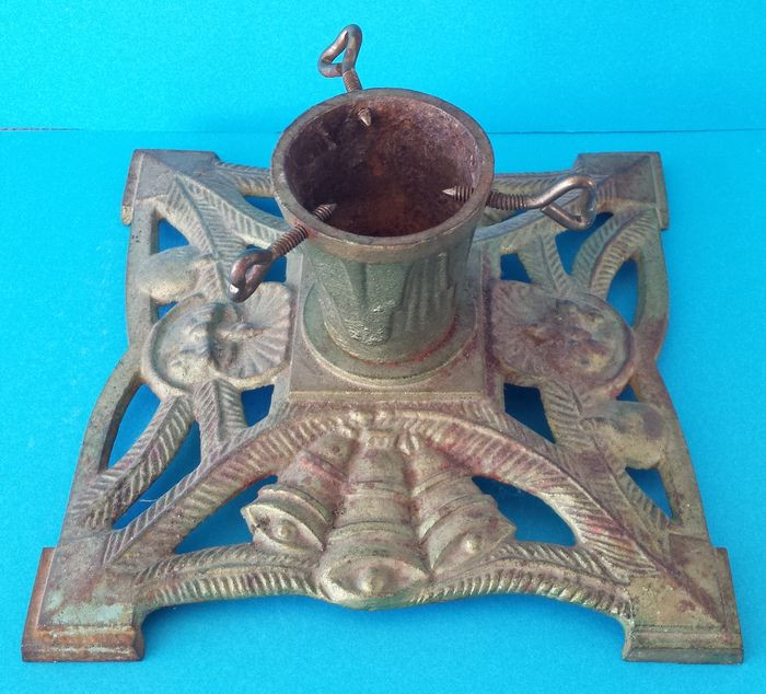 The Rooftop Christmas Tree Cast
 Christmas tree stand cast iron in patinated condition