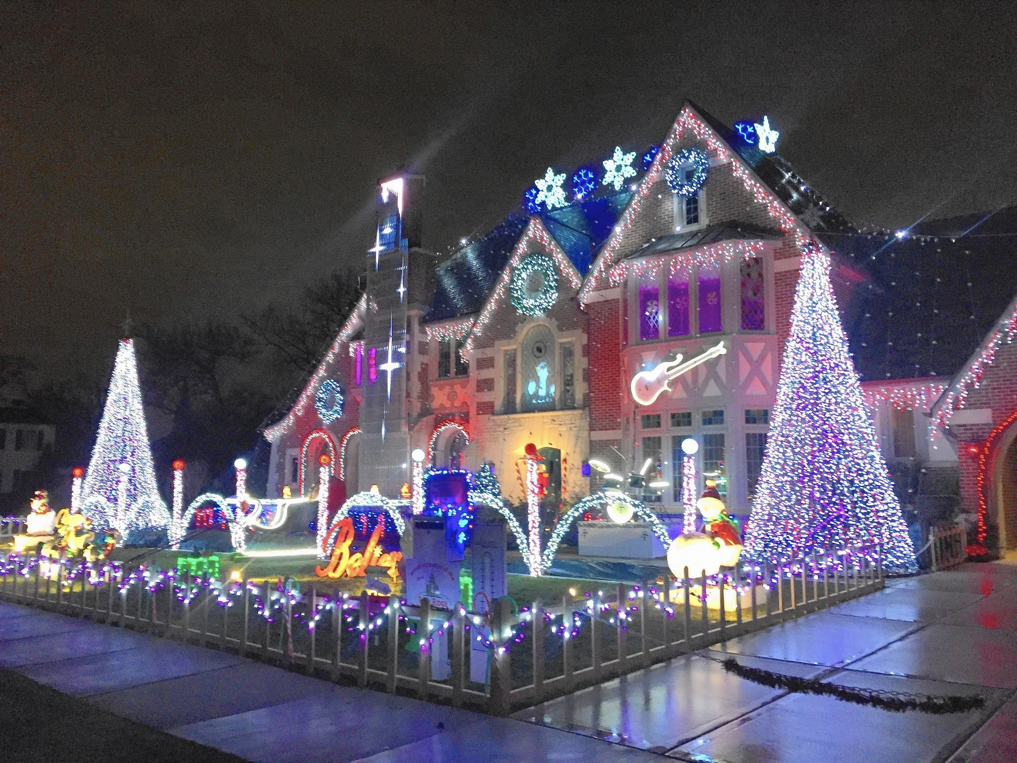 Whole House Christmas Lighting
 Christmas light show at Park Ridge home features tribute