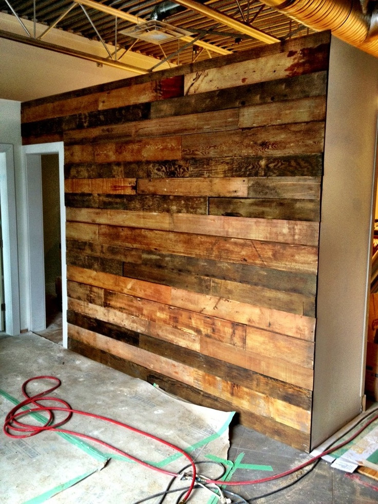Wood Wall DIY
 This reclaimed wall could be a great look as a backdrop to